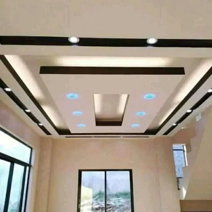 Designer recessed ceiling with feature lighting installed by Wozoli